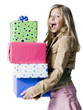 "Girl (10--11) holding a stack of presents, portrait"