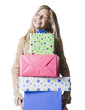 "Girl (10--11) holding a stack of presents, portrait"