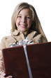 "Girl (10--11) standing with gift, portrait"