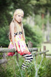 Girl on fence