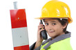 Child with yellow helmet