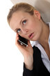 Blond businesswoman making call