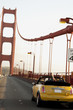 "USA, California, San Francisco, yellow car on Golden Gate Bridge"