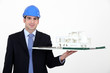 Architect with model in hand