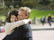 Photo: USA, New York City, Manhattan, Central Park, Mature couple embracing in Central Park USA, New York City, Manhattan, Central Park, Mature couple embracing in Central Park