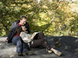 Photo: USA, New York City, Manhattan, Central Park, Mature couple reading book in Central Park USA, New York City, Manhattan, Central Park, Mature couple reading book in Central Park