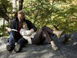 Photo: USA, New York City, Manhattan, Central Park, Mature couple reading book in Central Park USA, New York City, Manhattan, Central Park, Mature couple reading book in Central Park