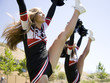 USA, Utah, American Fork, Cheerleaders doing high kick