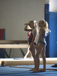USA, Utah, Orem, girls (10-11) standing on mat in gym