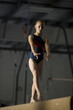 USA, Utah, Orem, girl (10-11) exercising on balance beam