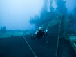 Grenada, Caribbean Sea, Scuba diver next to shipwreck
