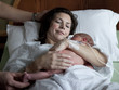 USA, Utah, Payson, Mother embracing newborn baby