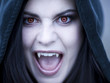 "USA, Utah, Cedar Hills, Portrait of female teenage vampire (16-17) wearing hood"