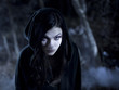 "USA, Utah, Cedar Hills, Portrait of female teenage vampire (16-17) wearing hood"