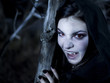 "USA, Utah, Cedar Hills, Portrait of female teenage vampire (16-17) wearing hood"
