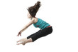 Woman jumping with arms outstretched