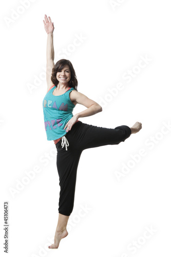 Photo: Studio portrait of woman exercising Studio portrait of woman exercising