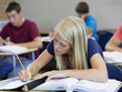Photo: "USA, Utah, Spanish Fork, School girl (16-17) working in classroom" "USA, Utah, Spanish Fork, School girl (16-17) working in classroom"
