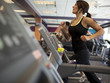 "USA, Utah, Draper, Woman exercising on treadmill"