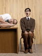 Bored businessmen resting in office
