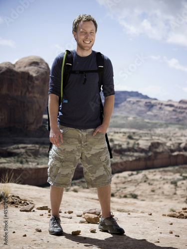 Photo: man on a hiking trip in the desert man on a hiking trip in the desert