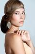 Beautiful woman with evening make-up and evening hairstyle. Jewe