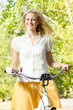happy young woman on the bicycle