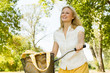 happy young woman on the bicycle