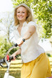 happy young woman on the bicycle