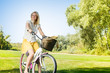 happy young woman on the bicycle