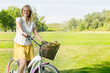 happy young woman on the bicycle