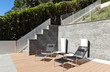 beautiful house outside, modern style, two deckchair