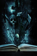 Photo: Open story book with Halloween stories coming alive Open story book with Halloween stories coming alive