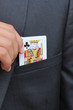 Photo: Pulling the King Card out of the pocket Pulling the King Card out of the pocket
