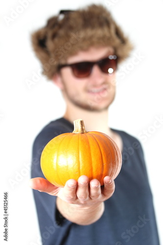 Holding A Pumpkin