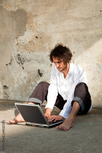 Photo: boy write on a laptop boy write on a laptop