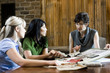 three women selecting flooring