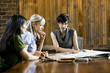 three women selecting flooring