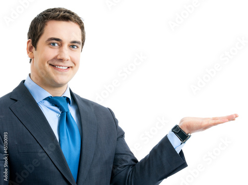 Photo: Business man showing, isolated Business man showing, isolated