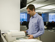 man in a blue shirt at work