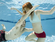 man saving a woman from drowning
