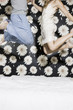 couple jumping on the bed