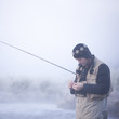 Photo: man fishing in a river man fishing in a river