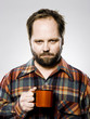 man holding a mug