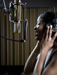 singing in a recording studio