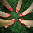 "USA, Utah, Salt Lake City, Close-up on six women feet in red peeptoe shoes"