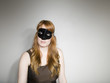 Studio shot of woman wearing mask