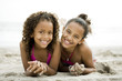 "USA, California, Los Angeles, Portrait of two girls (6-11) on beach"