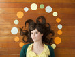 Portrait of young woman against wooden background with decoration