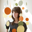 Portrait of young woman under hanging decoration
